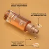 A bottle of Wella Ultimate Smooth Oil Serum with descriptive text and droplets of oil. Produktbild-Vorschau
