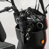 A close-up view of the handlebars and dashboard of a red and black scooter. Produktbild-Vorschau