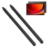 Two black stylus pens are shown diagonally on a white background, with a tablet in the background. Produktbild-Vorschau