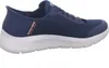 A side view of a blue Skechers slip-on sneaker with a white sole. Anteprima dell’immagine prodotto