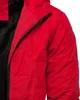 Close-up of a red winter jacket with a black zipper. Produktbild-Vorschau