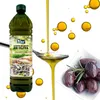 A bottle of olive oil is shown with oil pouring into a spoon, surrounded by floating oil droplets and a bowl of olives. Produktbild-Vorschau