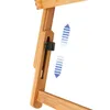 A close-up view of the adjustable mechanism on a bamboo laptop table. Produktbild-Vorschau