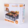 The image shows the packaging of a Petra electric grill, featuring an image of the grill with food on it and some marketing text. Produktbild-Vorschau