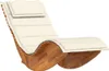 A wooden rocking lounge chair with a cream-colored cushion, shown against a white background. Anteprima dell’immagine prodotto