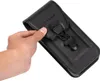 A hand is holding a black leather phone holster. Náhled obrázku produktu