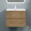 A wall-mounted bathroom vanity with a sink and faucet against a textured gray wall. Produktbild-Vorschau
