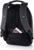 The back of a black and gray backpack is shown, with a passport and some papers peeking out of a hidden pocket. Anteprima dell’immagine prodotto