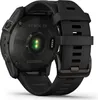 The back of a black Garmin Fenix 7X smartwatch with its heart rate sensor visible. Produktbild-Vorschau