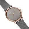 A close-up studio shot of a Bering watch with a gray dial and rose gold case, set against a white background. Náhled obrázku produktu