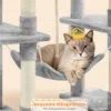 A cat is relaxing in a hammock on a cat tree. Podgląd zdjęcia produktu