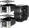 A black and silver air fryer with two baskets and racks shown separately from the main unit. Anteprima dell’immagine prodotto