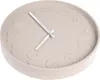 A close-up, slightly angled view of a beige wall clock with embossed numbers. Anteprima dell’immagine prodotto