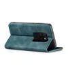 A teal flip case for a Huawei Mate 20 phone is shown from the side, with the phone partially inserted. Produktbild-Vorschau