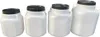Four white plastic containers with black lids are lined up against a white background. Produktbild-Vorschau