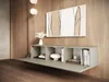 A modern living room with a wall-mounted TV lowboard, artwork, and decorative items. Produktbild-Vorschau