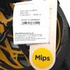 A close-up of a bicycle helmet with a tag attached. Produktbild-Vorschau