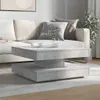 A modern living room with a couch and coffee table. Náhľad obrázku produktu