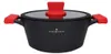 A black pot with red handles and lid knob, shown from a front-side angle on a white background. Náhled obrázku produktu