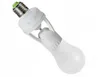 A white motion sensor lamp holder with a light bulb attached, shown against a white background. Produktbild-Vorschau
