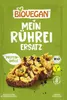 A green package for a vegan scrambled egg substitute, showing a serving suggestion of the product on toast. Voir les images du produit