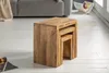 A set of three nesting wooden tables on a light-colored floor, with a sofa and a magazine rack in the background. Produktbild-Vorschau