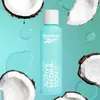 A bottle of Reebok Active Hydration body mist surrounded by coconut pieces and water droplets against a light blue background. Produktbild-Vorschau
