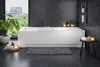 A modern bathroom with a bathtub, plants, and decorative items. Produktbild-Vorschau