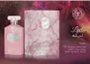A perfume bottle and its box are displayed with marketing text and notes. Podgląd zdjęcia produktu