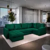 A spacious living room with a large, green sectional sofa. Produktbild-Vorschau