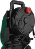 A close-up side view of a green and black pressure washer with a coiled hose and power cord. Produktbild-Vorschau