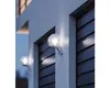 Two outdoor wall lights mounted on a building facade at dusk. Anteprima dell’immagine prodotto
