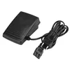 A black sewing machine foot pedal with a black cord and plug, shown on a white background. Náhľad obrázku produktu