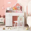 A child's vanity set with a chair in a bedroom setting. Voir les images du produit