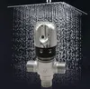 A shower head with water falling, and a thermostatic mixing valve in the foreground. Podgląd zdjęcia produktu