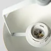 A close-up view of a light socket inside a white lamp shade. Podgląd zdjęcia produktu