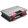 A black and clear plastic sortimentskasten (organizer box) with red latches and handles, shown from a diagonal angle. Produktbild-Vorschau