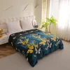 A blanket with a butterfly pattern is laid out on a bed. Produktbild-Vorschau
