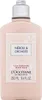 A bottle of L'Occitane body milk. Produktbild-Vorschau