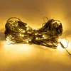 A tangled string of fairy lights with many small, glowing yellow LEDs. Produktbild-Vorschau
