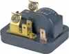 A close-up studio shot of a black electrical relay with gold and silver metal connectors. Produktbild-Vorschau