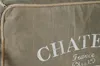 Close-up of a fabric product with text and rope trim. Náhľad obrázku produktu