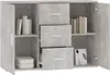 A sideboard with doors and drawers, displaying books, storage containers, and a framed picture. Produktbild-Vorschau