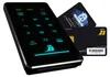 A black digital keypad device with illuminated blue numbers and symbols, next to two black smart cards, one with a security graphic and text, and the other with a logo and barcode. Produktbild-Vorschau