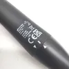A close-up view of the branding and regulatory markings on a black product. Podgląd zdjęcia produktu