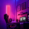 A gaming setup with a chair, computer, and ambient lighting. Produktbild-Vorschau
