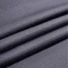 A close-up view of dark gray fabric with folds and texture. Náhled obrázku produktu