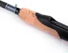A close-up view of the handle and reel seat of a fishing rod. Anteprima dell’immagine prodotto