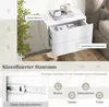 A white nightstand with two drawers, shown in a bedroom setting with a plant and a bed in the background. The image also includes diagrams and text highlighting features. Podgląd zdjęcia produktu