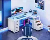 A modern L-shaped gaming desk setup with a curved monitor, laptop, computer tower, and gaming chair, illuminated by blue LED lighting. Podgląd zdjęcia produktu